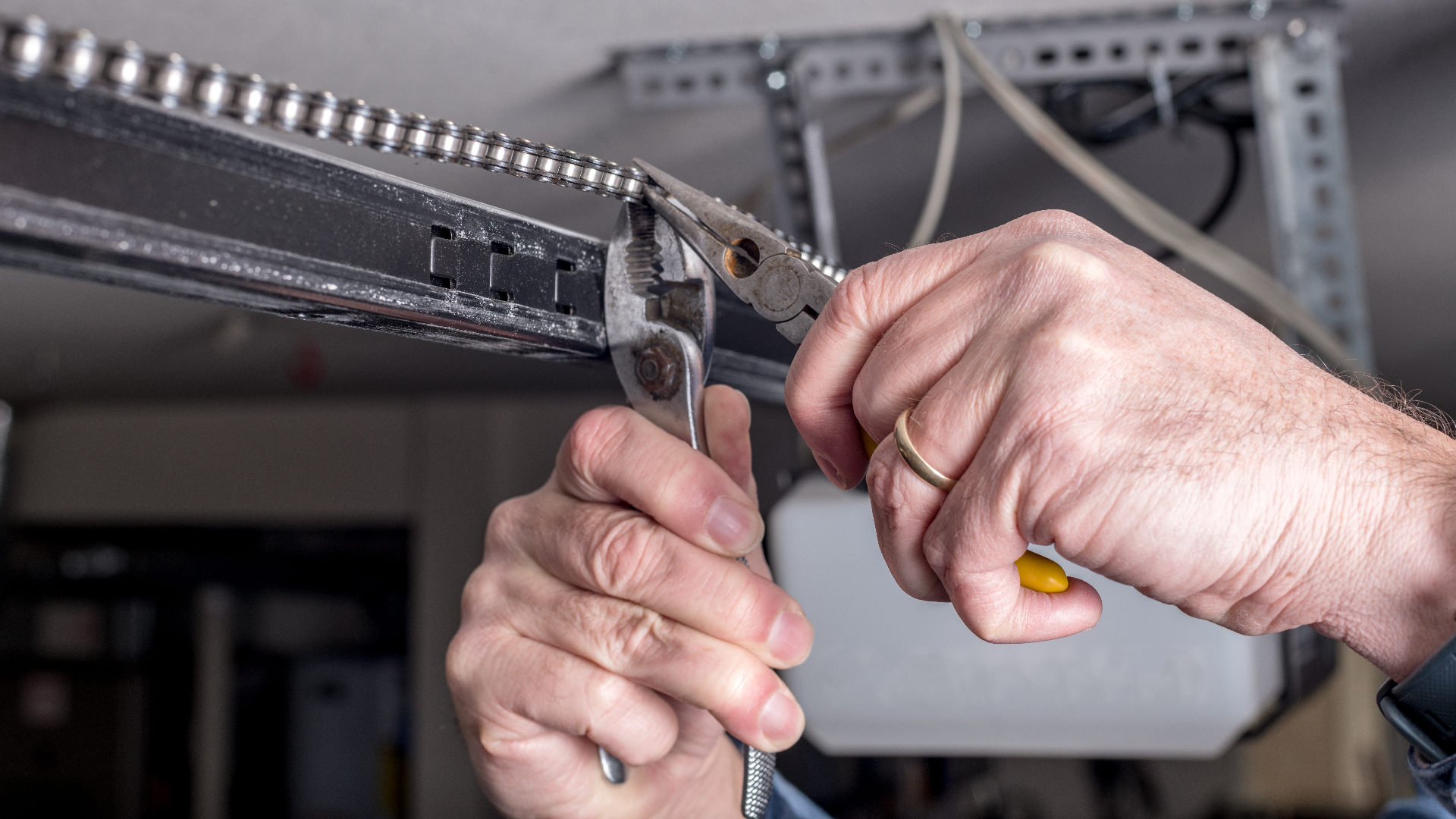 Garage door cable replacement with drum re-seating and rebalancing