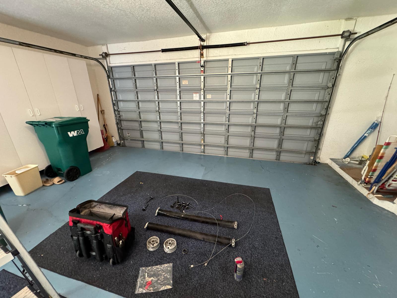 Torsion spring replacement on a residential garage door
