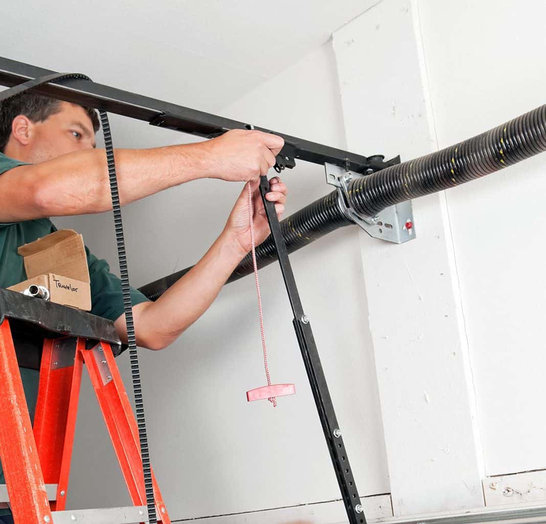 Garage door torsion spring replacement by a licensed technician